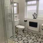 Follies & With Ocean Views